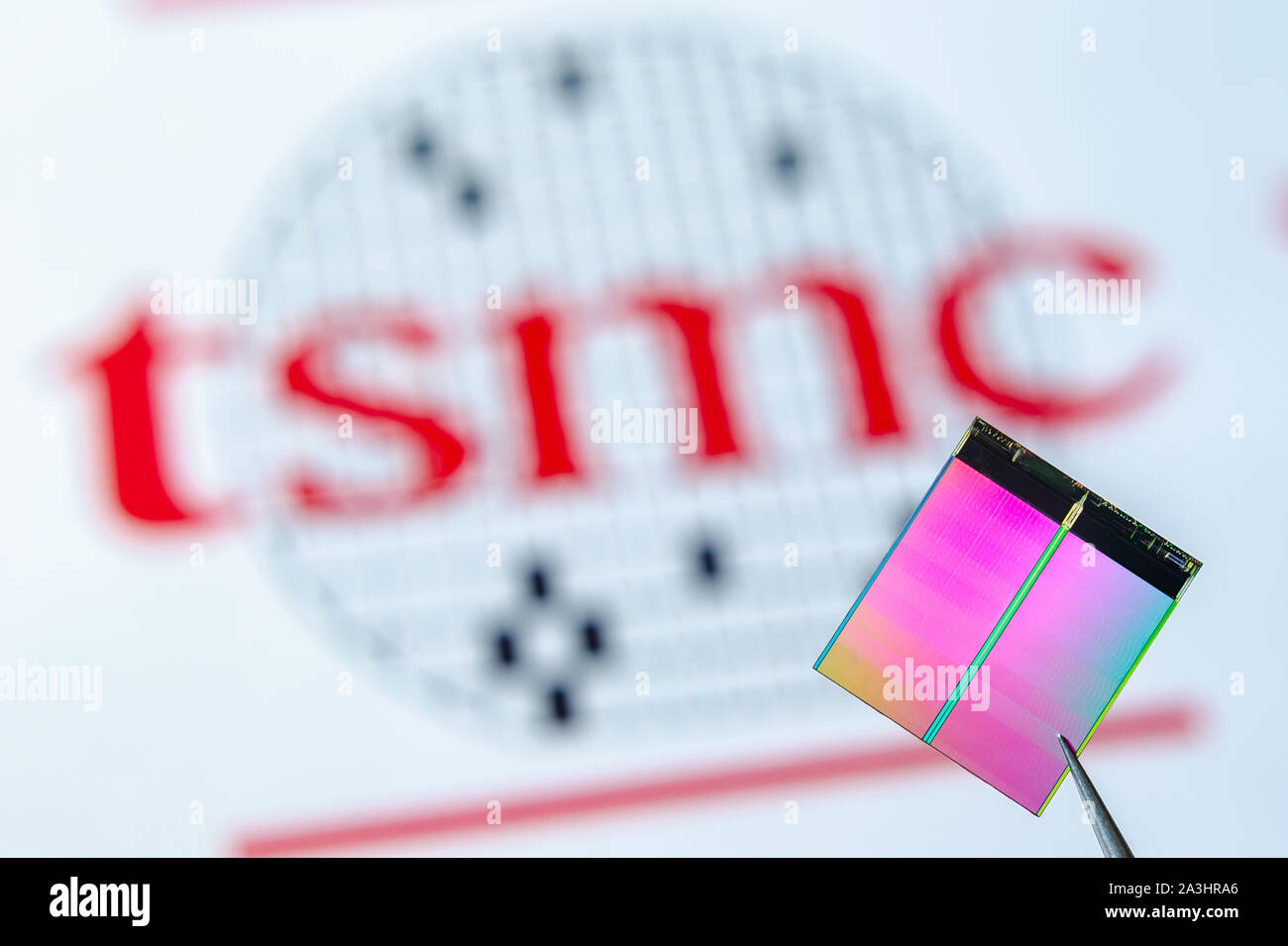 Close up photo of microchip (aka semiconductor chip, semiconductor device, Integrated Circuit