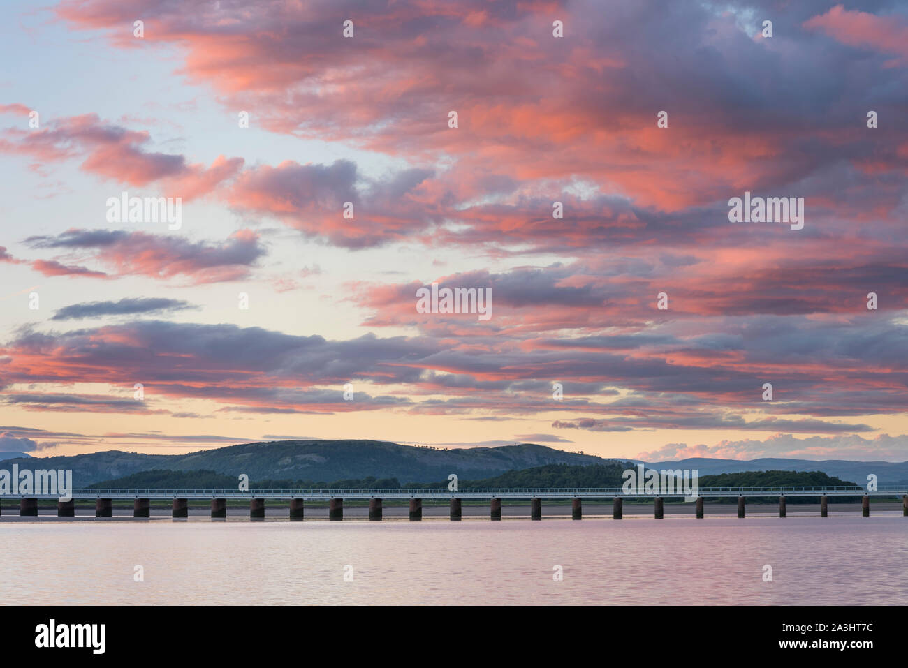 Sunset over the Kent viaduct, Arnside, Cumbria. Stock Photo