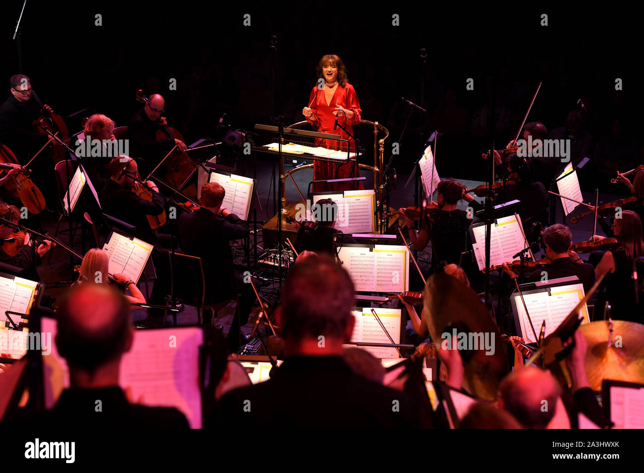 Debbie Wiseman conducts the Bournemouth Symphony Orchestra and Chorus at Classic FM Live at London's Royal Albert Hall. Stock Photo