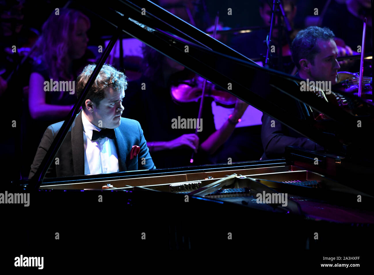 Benjamin Grosvenor performs at Classic FM Live at London's Royal Albert Hall. Stock Photo