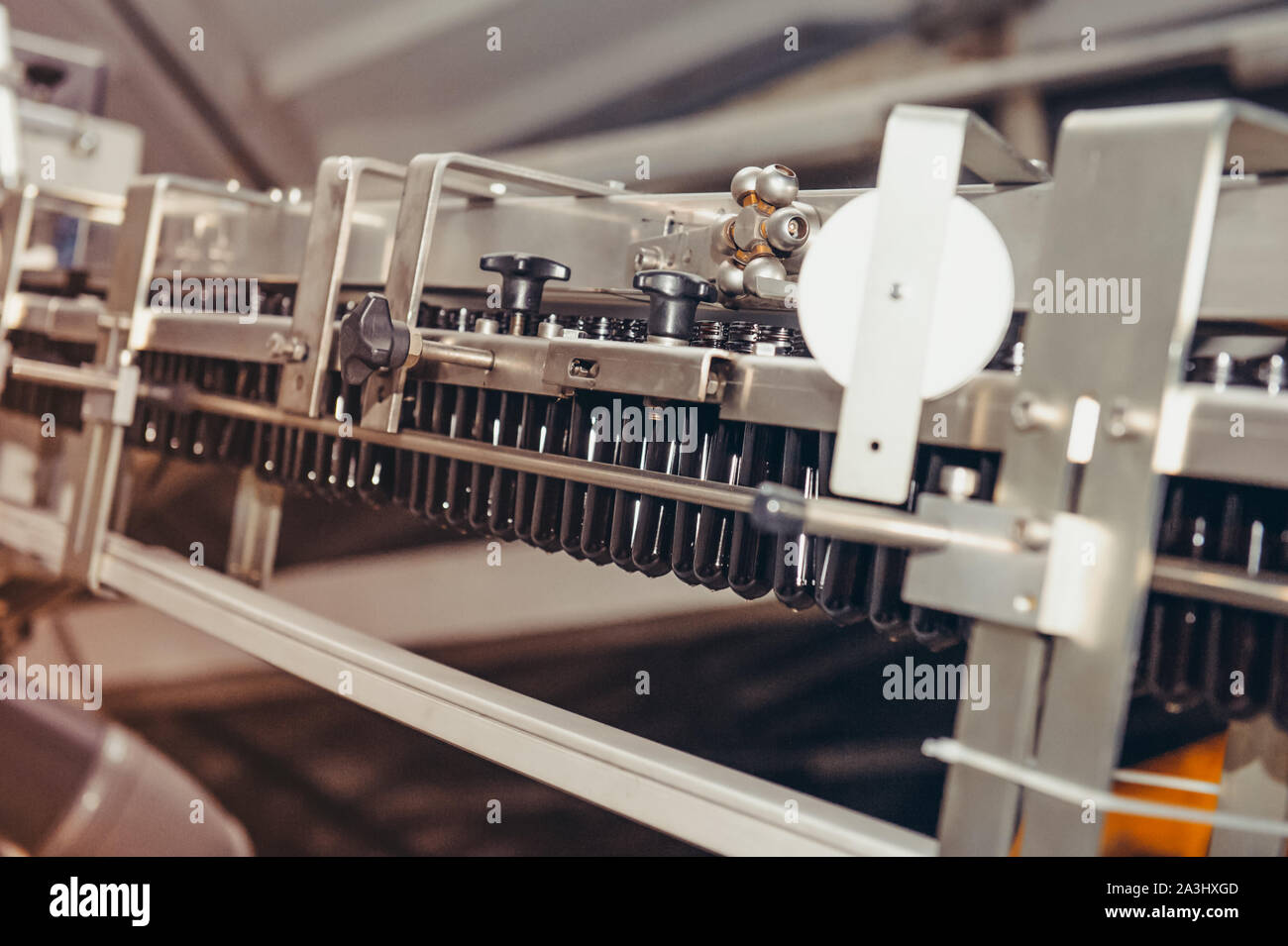 PET Preform in PET bottles blowing. The plastic bottle blowing machine