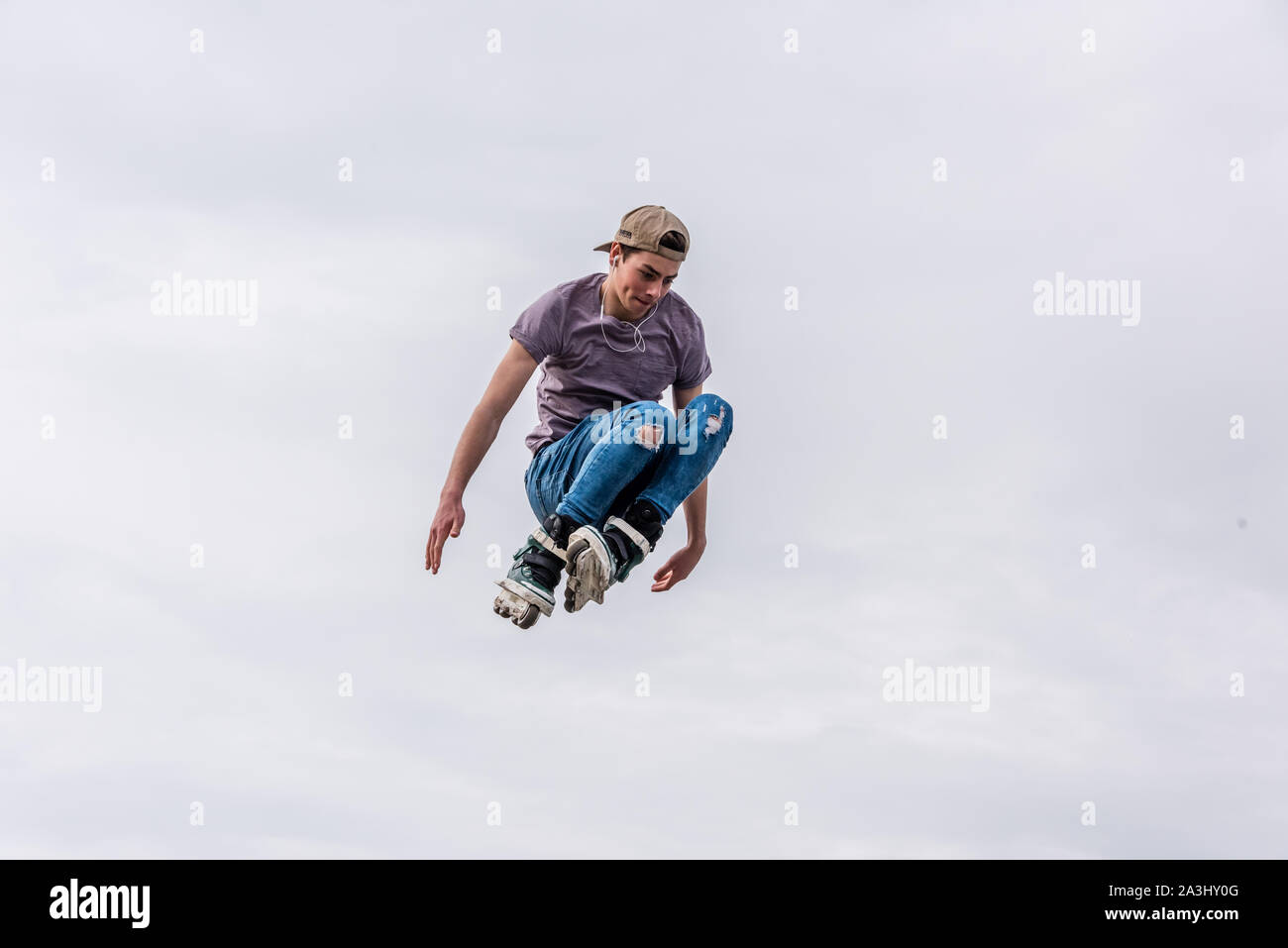 Amsterdam, Holland, October 2019, roller skater on half pipe flying ...