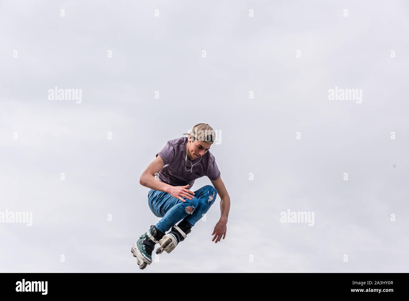 Amsterdam, Holland, October 2019, roller skater on half pipe flying ...