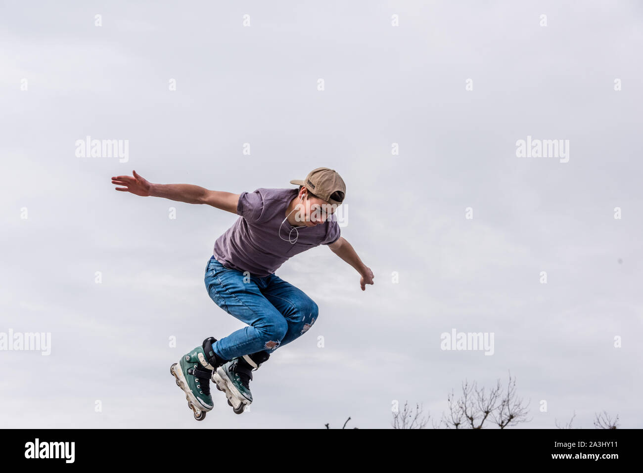 Amsterdam, Holland, October 2019, roller skater on half pipe flying ...