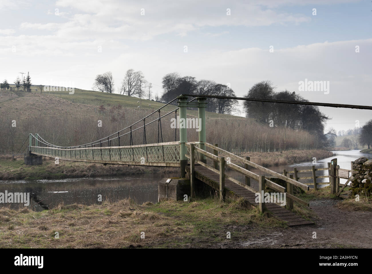Hebden suspension Bridge over the river Wharfe, North Yorkshire Stock