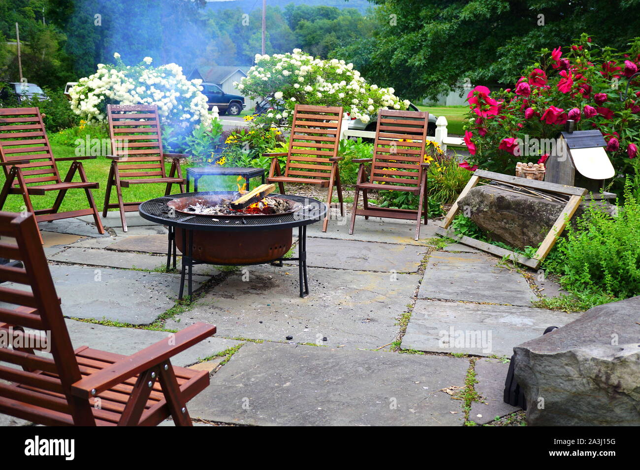 Outdoor living space with a fire pit Stock Photo
