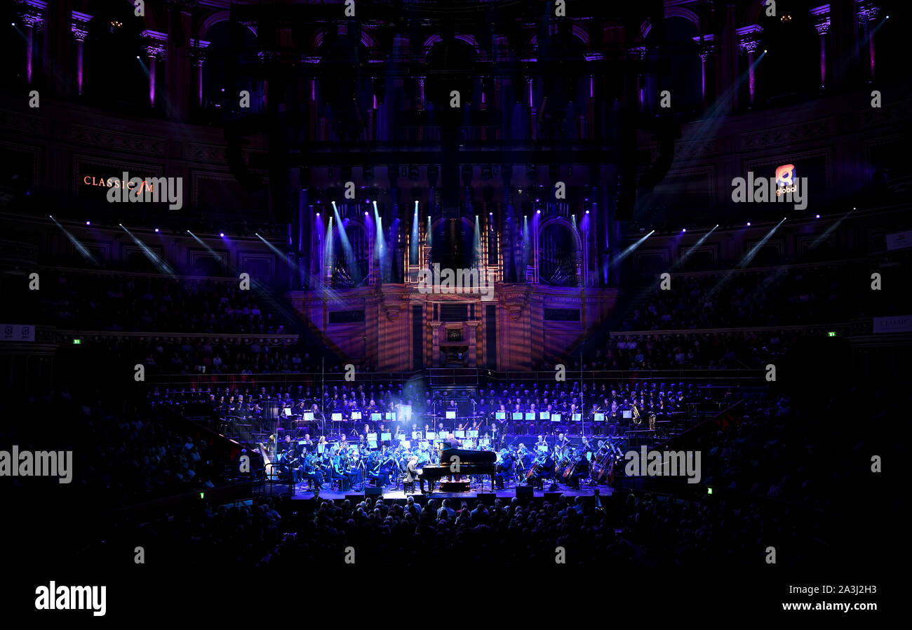 Benjamin Grosvenor performs with the Bournemouth Symphony Orchestra at Classic FM Live at London's Royal Albert Hall. Stock Photo