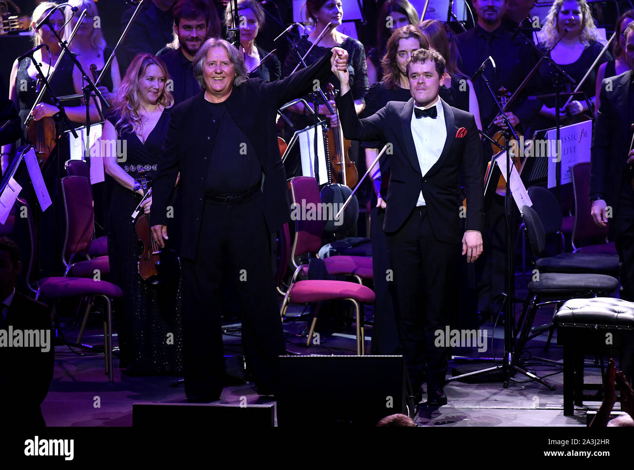 Benjamin Grosvenor with conductor Stephen Barlow at Classic FM Live at London's Royal Albert Hall. Stock Photo