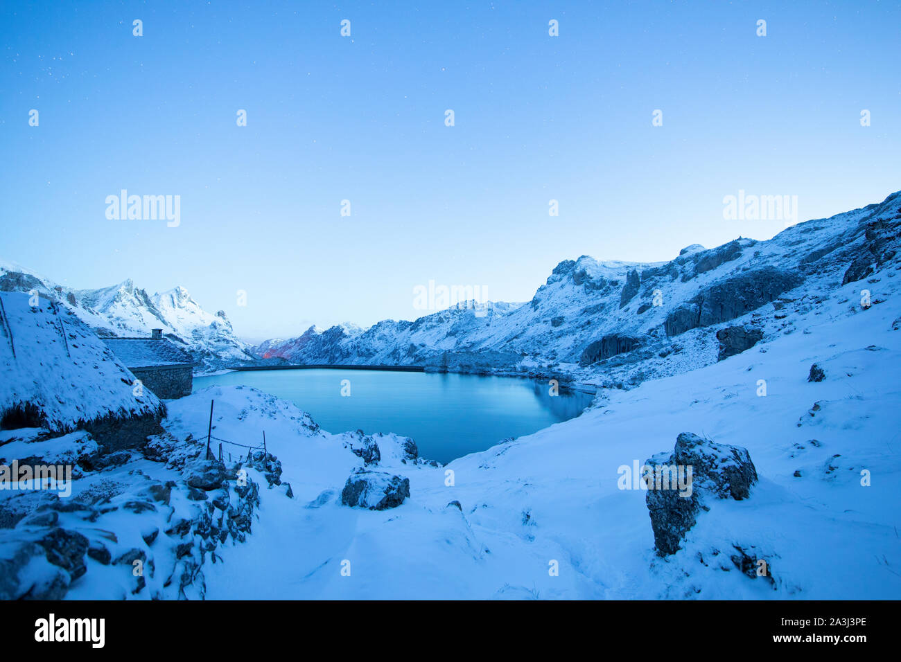 Blue Hour In Snow Environment And Cabins In Somiedo National Park