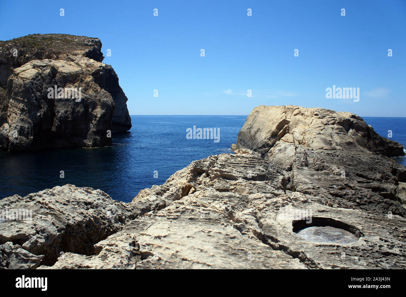 Fungus Rock and landscape of Dwejra Bay next to Azure Window (it-Tieqa Żerqa) in Xlendi, Gozo Stock Photo