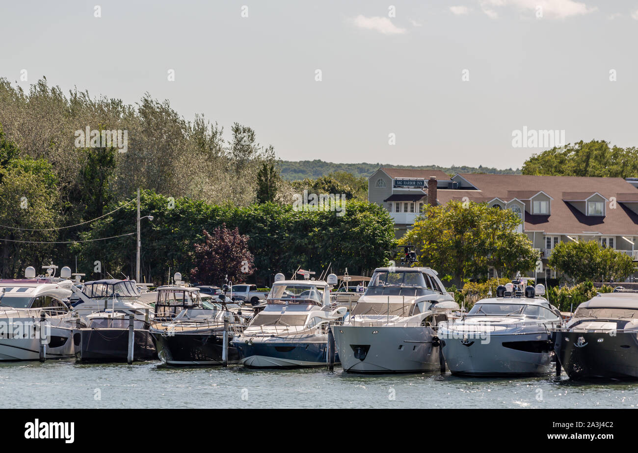 row of expensive yachts in Sag Harbor, NY Stock Photo
