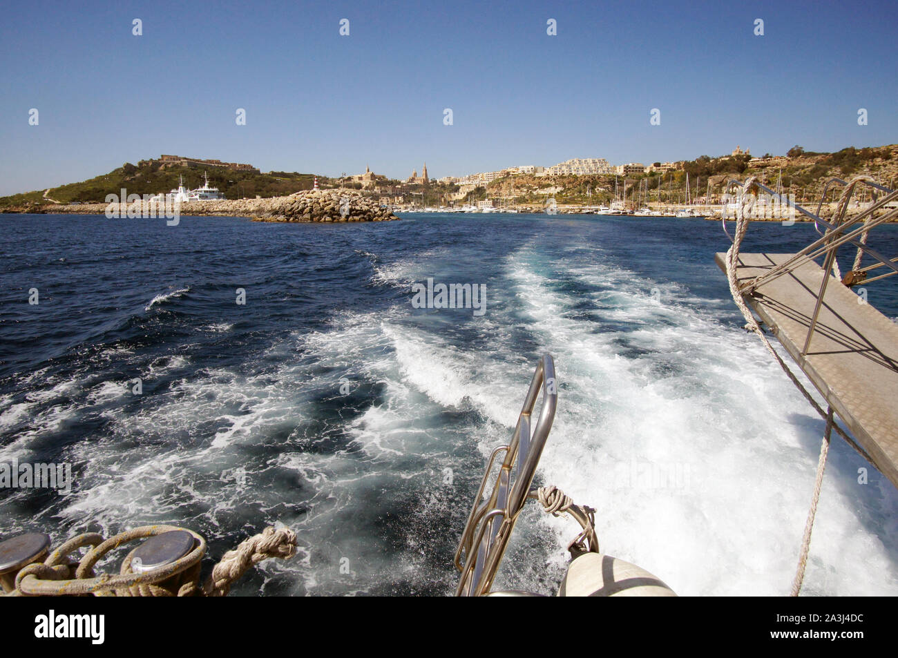 Landscape of Mgarr Harbor in Gozo, Malta visible from yacht deck Stock Photo