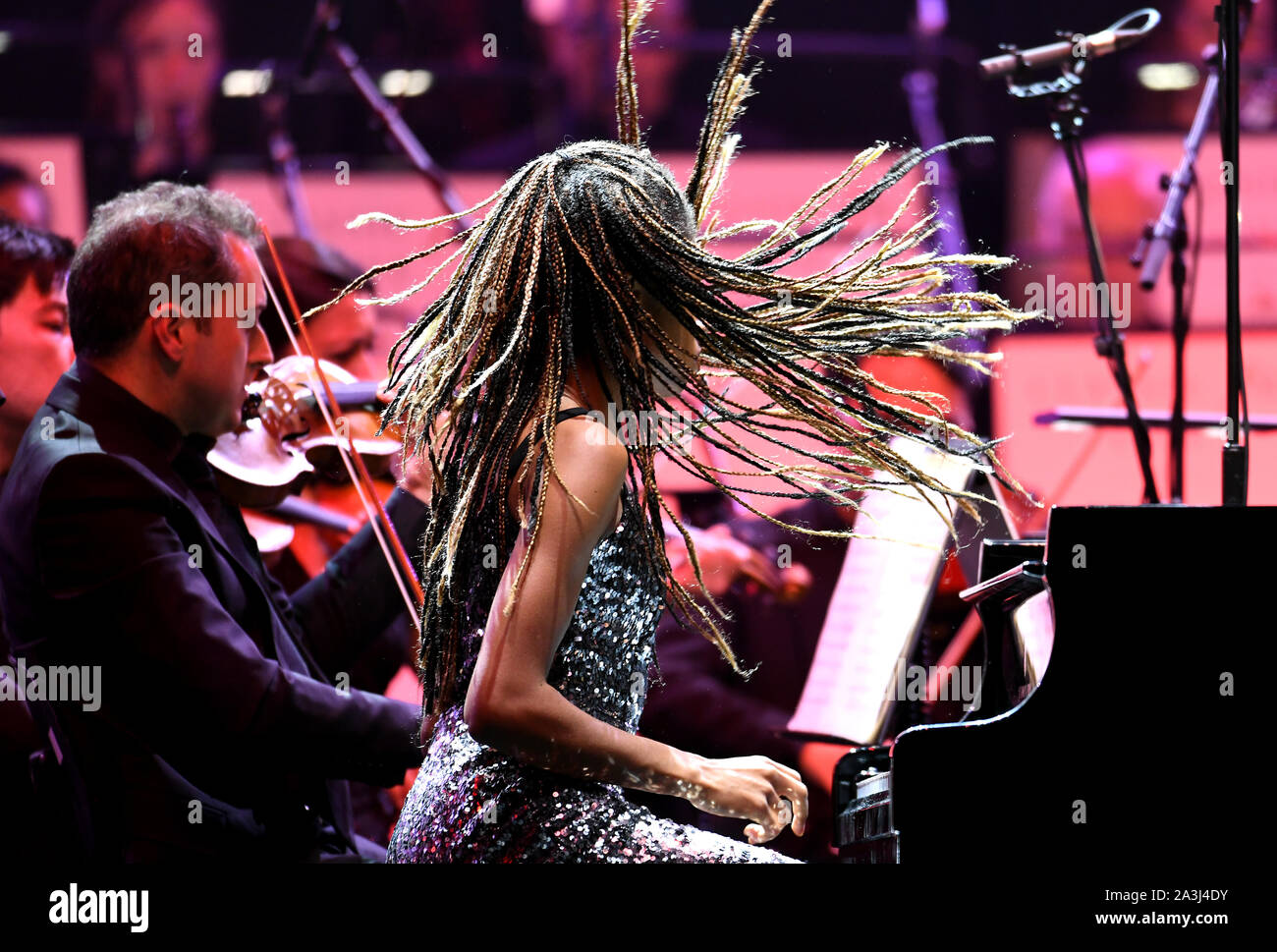 Isata Kanneh-Mason performs with the Bournemouth Sympathy Orchestra at Classic FM Live at London's Royal Albert Hall. Stock Photo