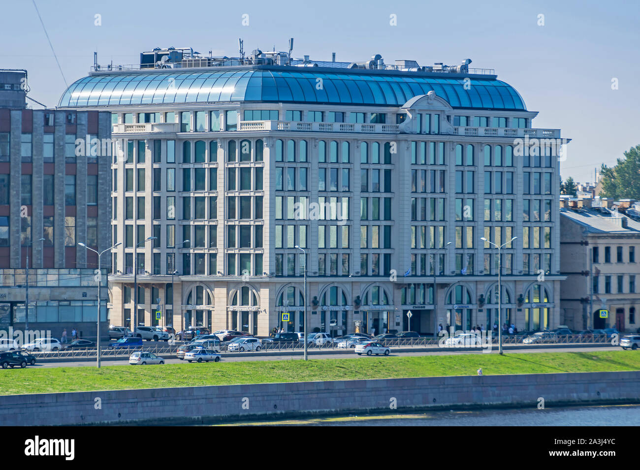 Saint Petersburg, Russia -  July 26, 2019: Sinopskaya Embankment of the River Neva with the building of the Business Center Sinop, winner of the award Stock Photo
