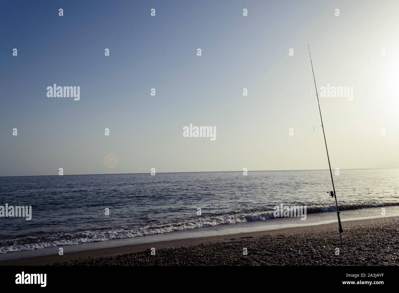 Fishing pole in the sand hi-res stock photography and images - Page 2 -  Alamy