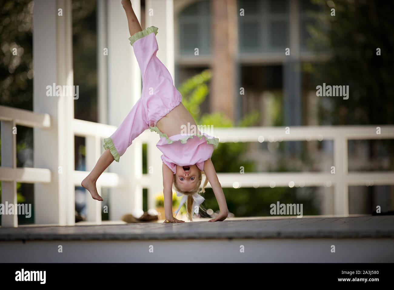 Girl doing a cartwheel hires stock photography and images Alamy