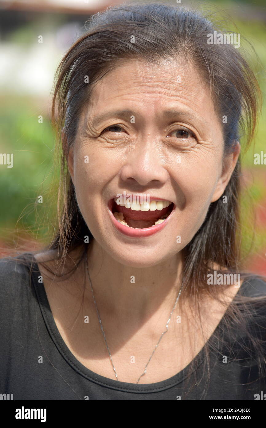 A Happy Older Diverse Person Stock Photo