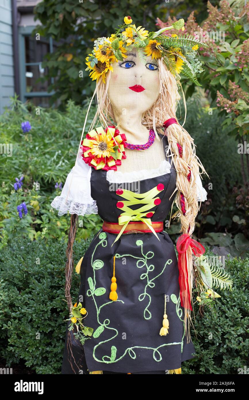 'Miss Oktoberfest', a scarecrow created by Bachman's Fridley, on display at the Minnesota Landscape arboretum in Chanhassen, Minnesota, USA. Stock Photo