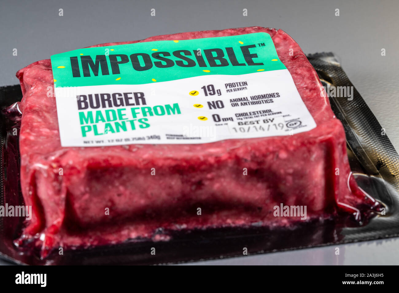 MORGANTOWN, WV - 8 October 2019: Packaging for Impossible Foods burger made from plants on steel background Stock Photo