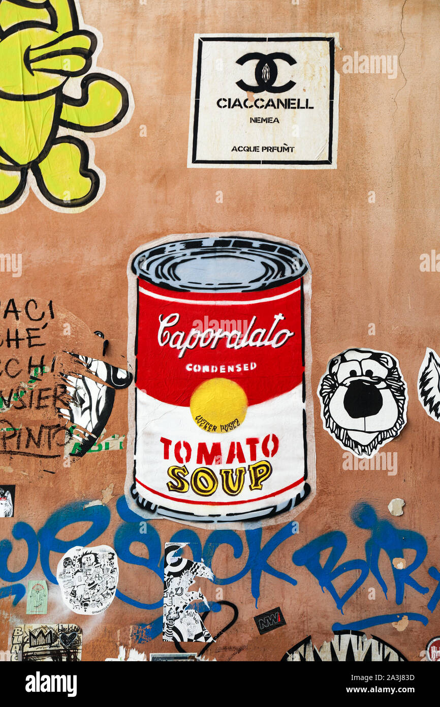 Street art poster - inspired by Andy Warhol's Campbell's Soup Can - protesting against illegal Caporalato agriculture worker hiring system in Italy Stock Photo