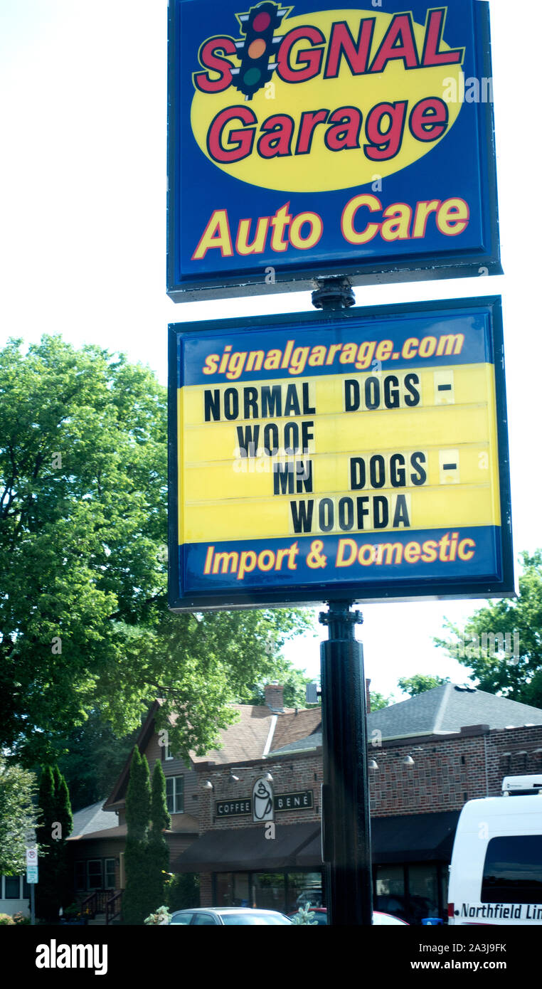 Humorous Sign At A Car Repair Garage Commenting On The Use Of The