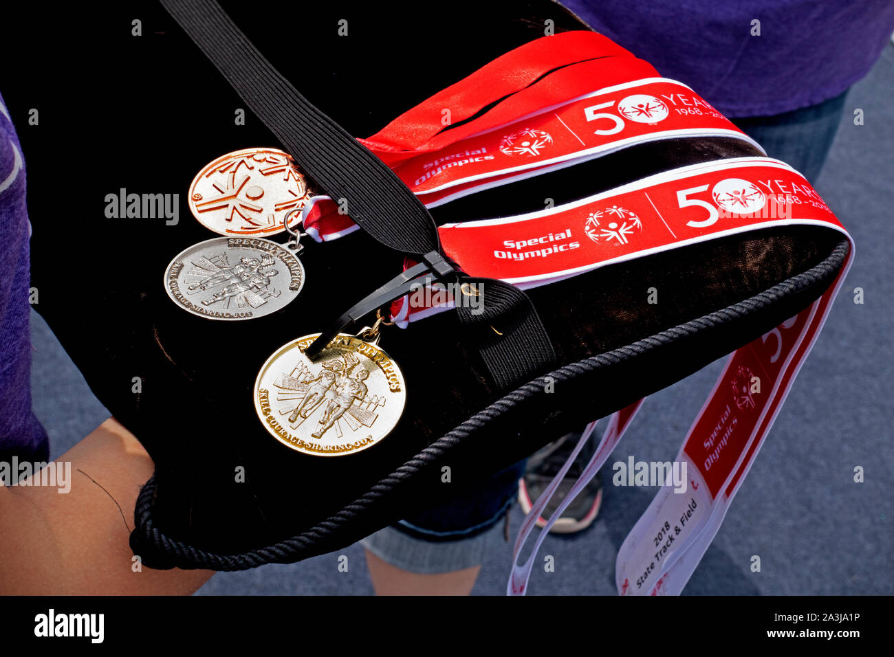 Special Olympic medals on black velvet ready to be awarded to Olympians