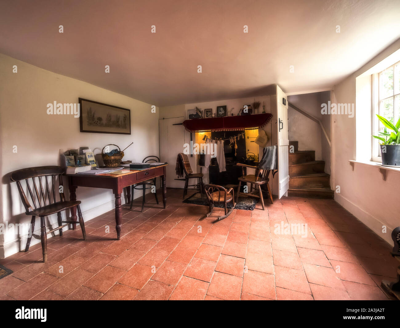 The sitting room of the charming Victorian era Marshmans Toad Hole Cottage near Ludham on the Norfolk Broads Stock Photo