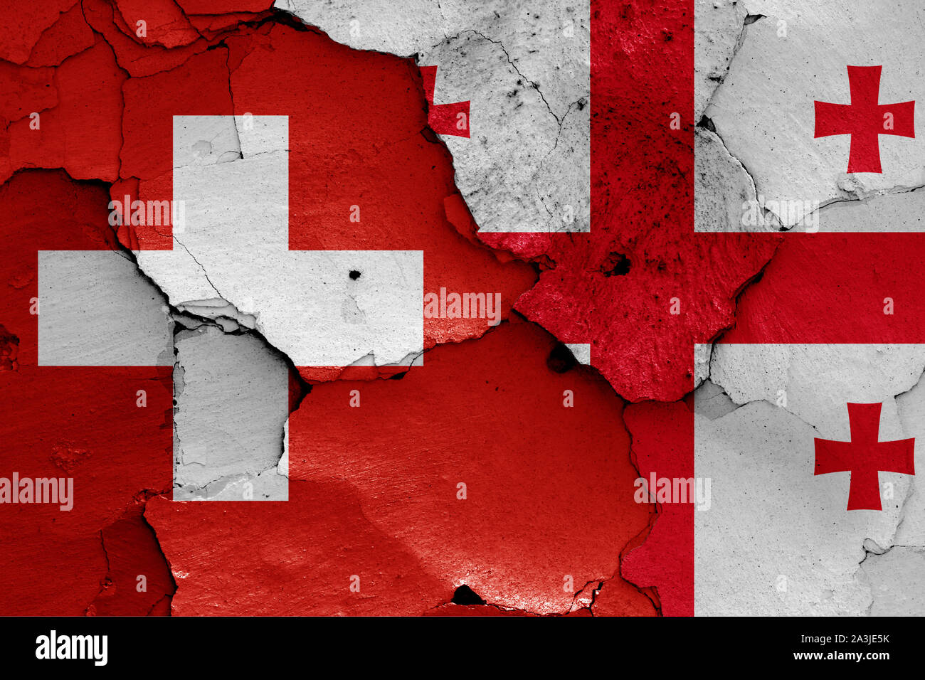 flags of Switzerland and Georgia painted on cracked wall Stock Photo ...