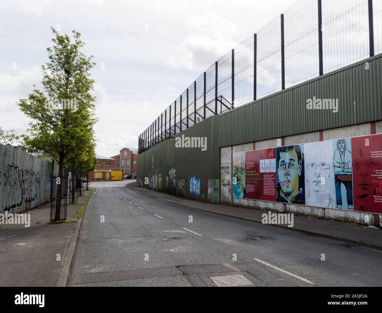 The peace line along Cupar Way in Belfast Stock Photo