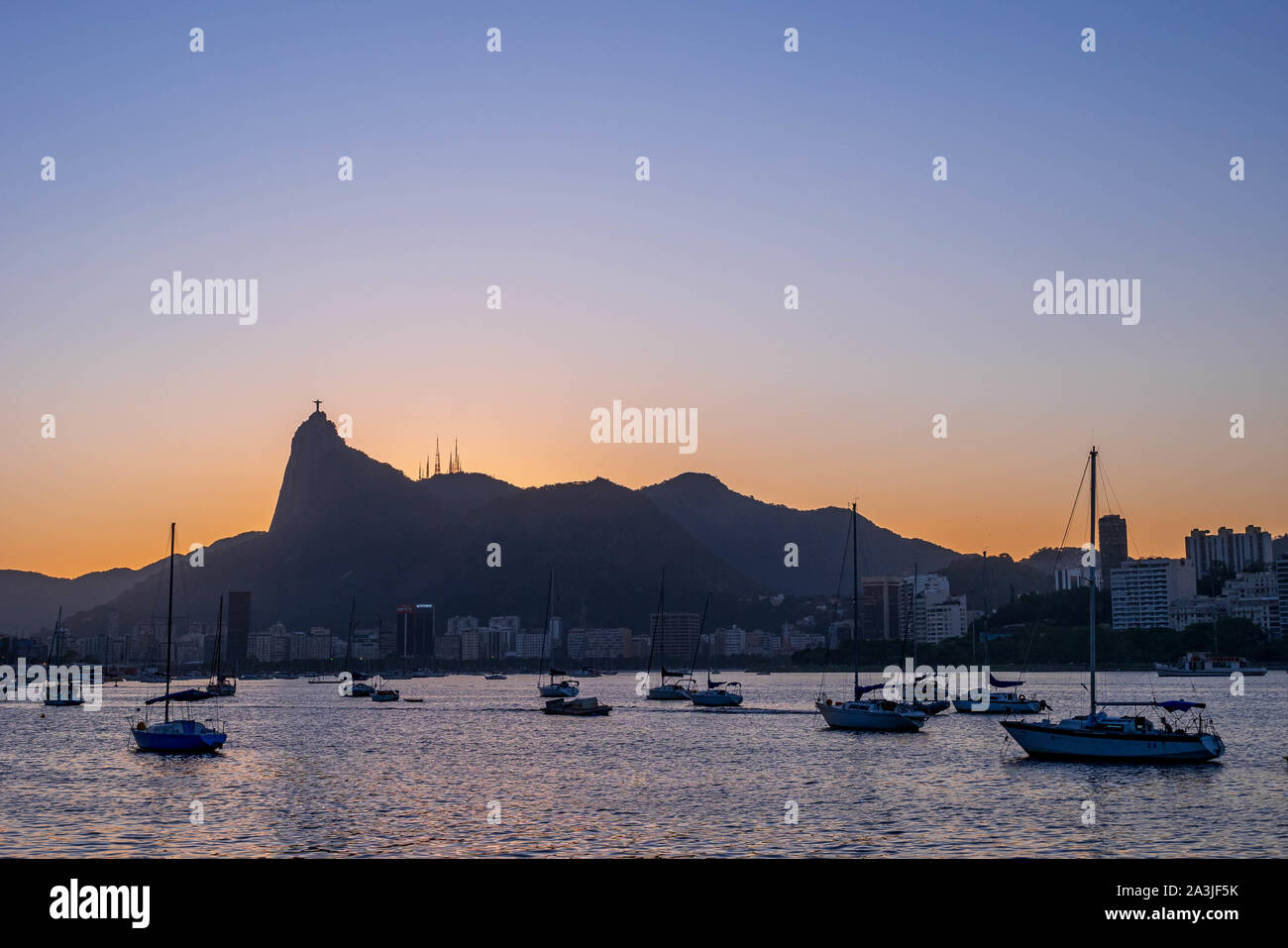 Rio de Janeiro, Brazil - October 3, 2019: beautiful sunset of Rio de Janeiro, with clear sky, mountain skyline, seen from the Mureta da Urca Stock Photo