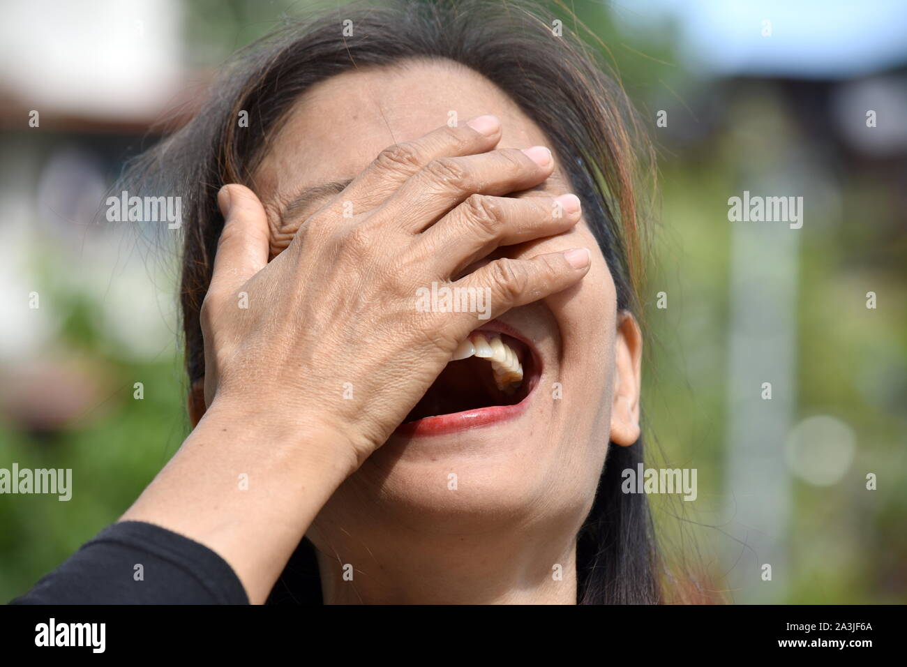 A Laughing Diverse Female Senior Stock Photo