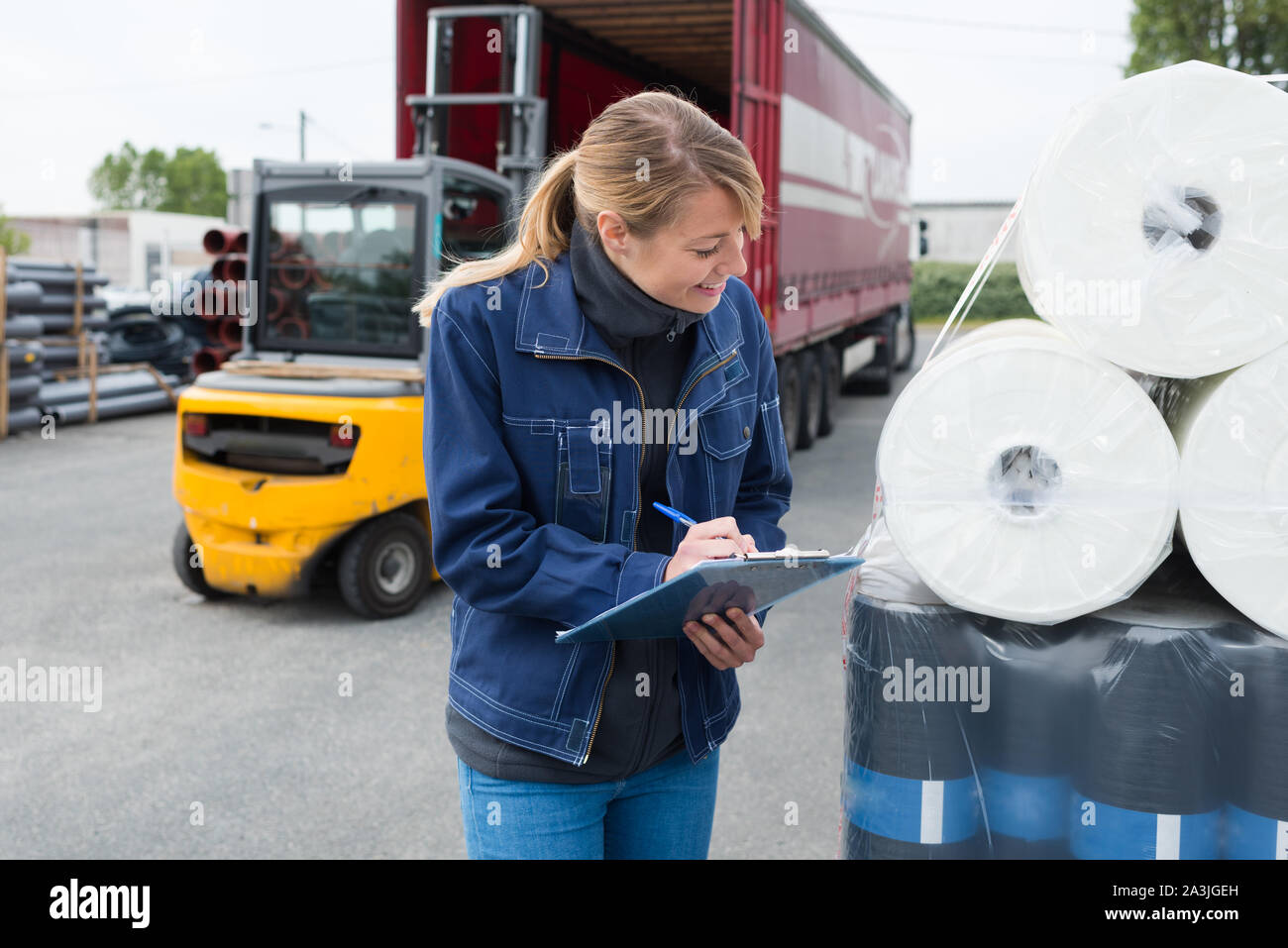 industrial supplier clerk inspecting delivery product Stock Photo Alamy