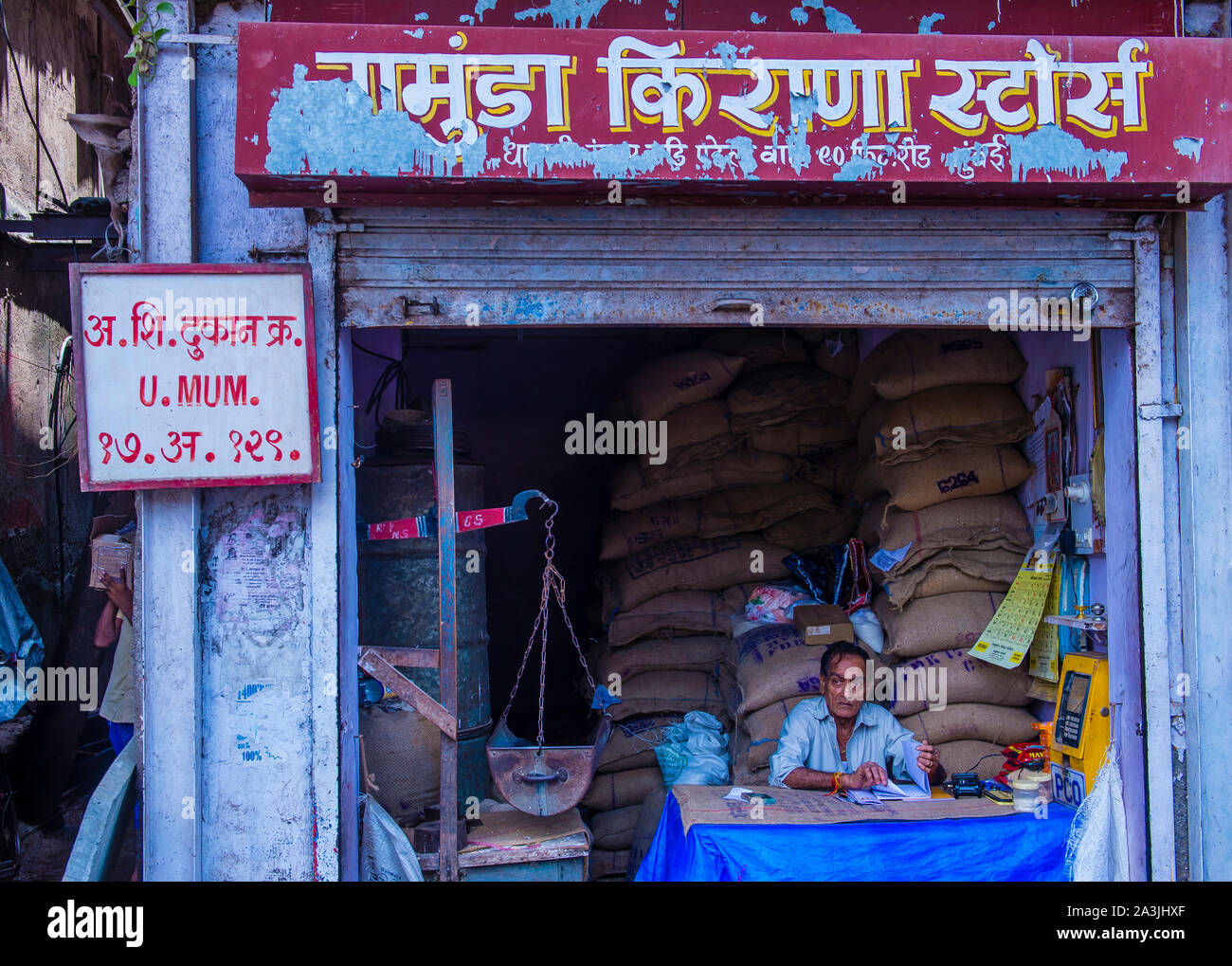Indian man in Dharavi neighbourhood in Mumbai , India Stock Photo