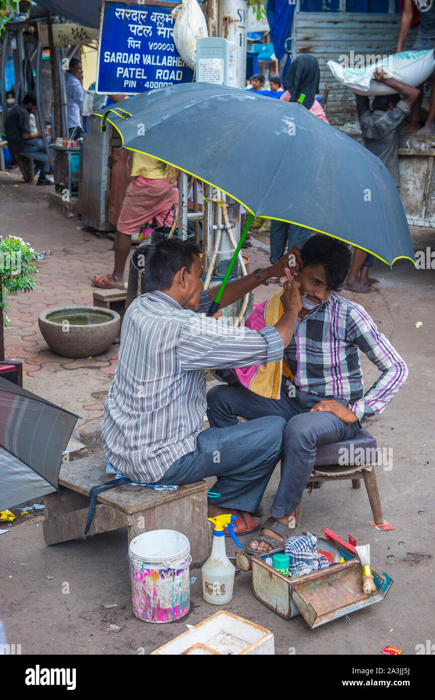 Indian people in Dharavi neighbourhood in Mumbai , India Stock Photo