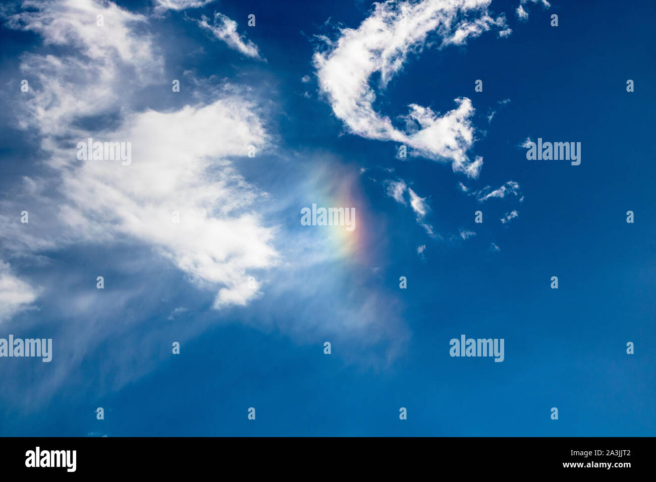 Cumulus cloud rainbow hi-res stock photography and images - Alamy