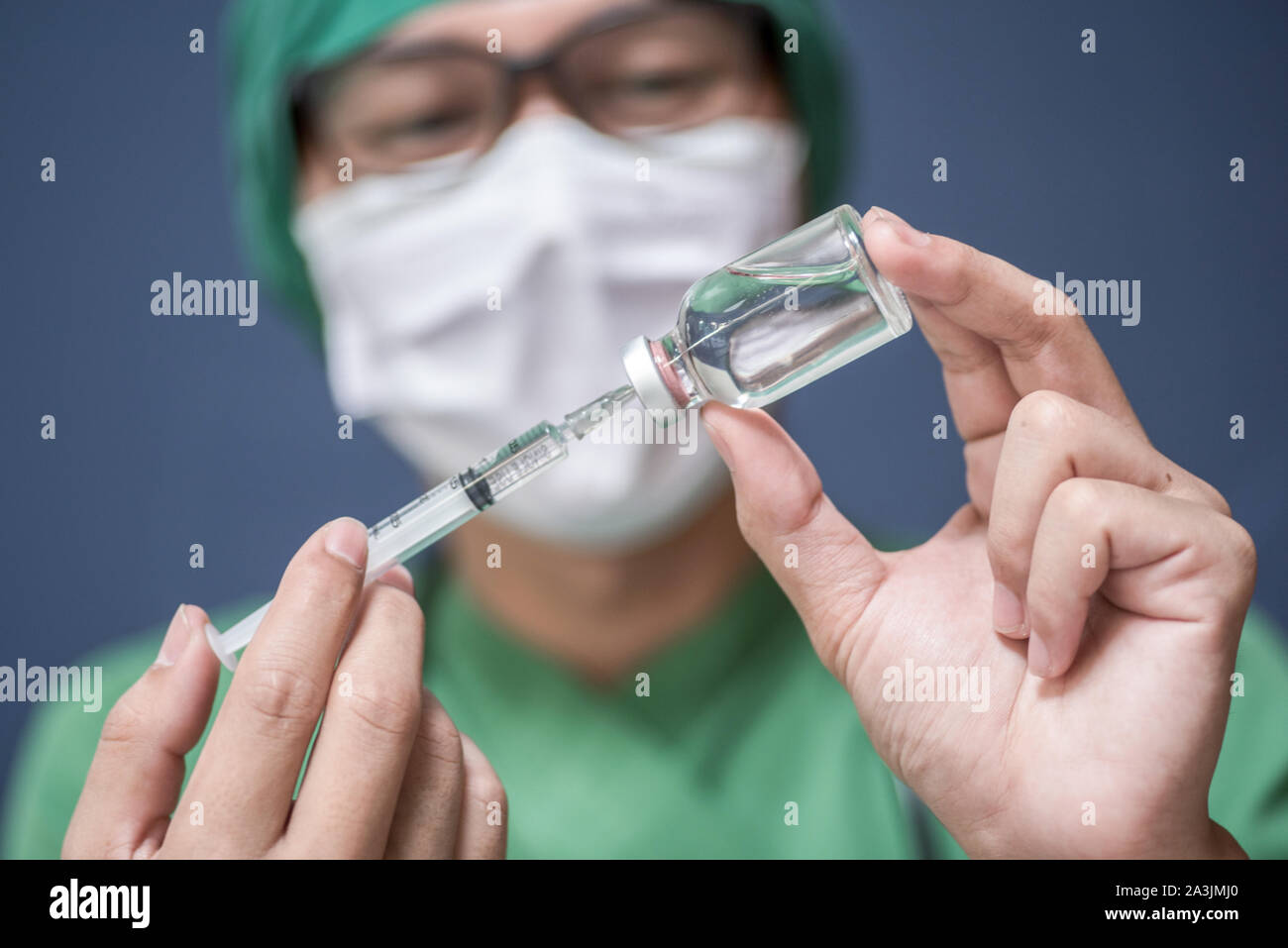 Doctor hold syringe prepare for injection,Epidural analgesia,Epidural nerve block, spinal block,Health care concept. , Stock Photo
