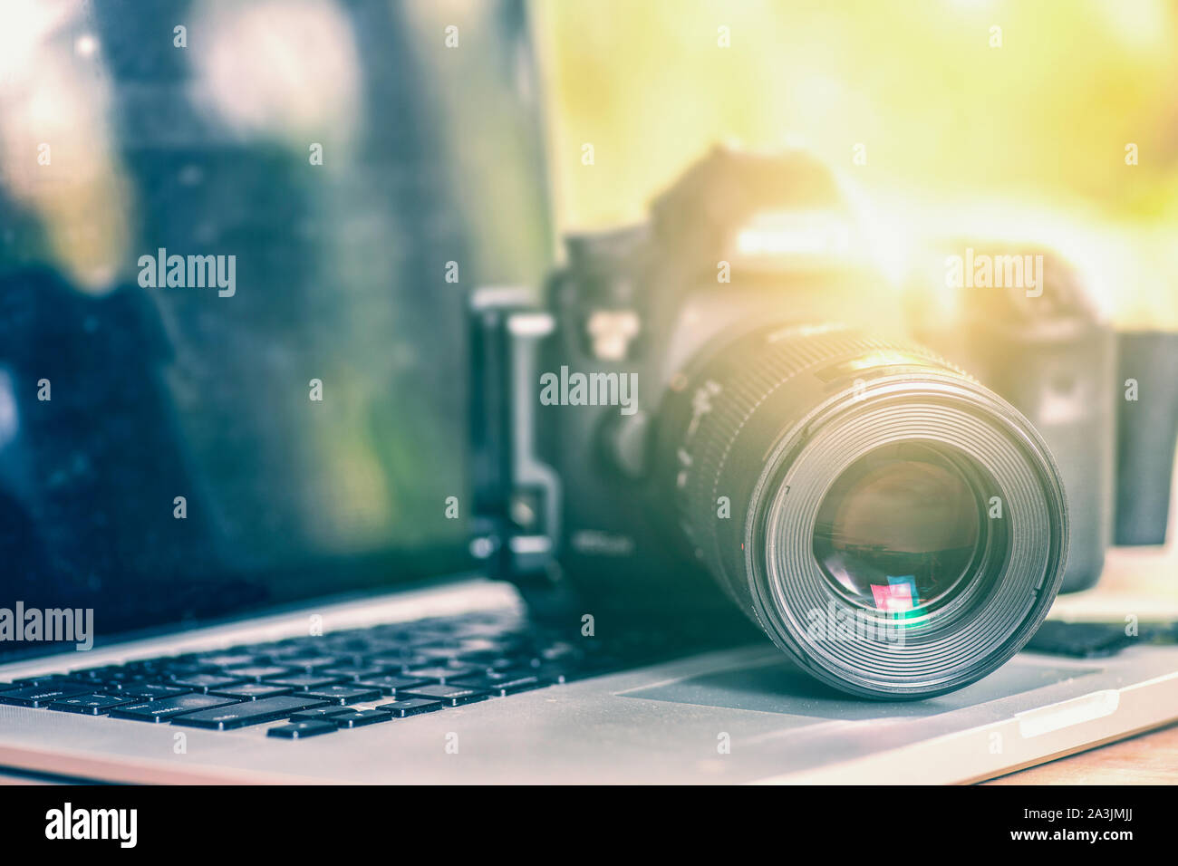 Digital Photography Workstation. Modern Digital DSLR Camera, Laptop Computer  and Display Stock Photo - Alamy