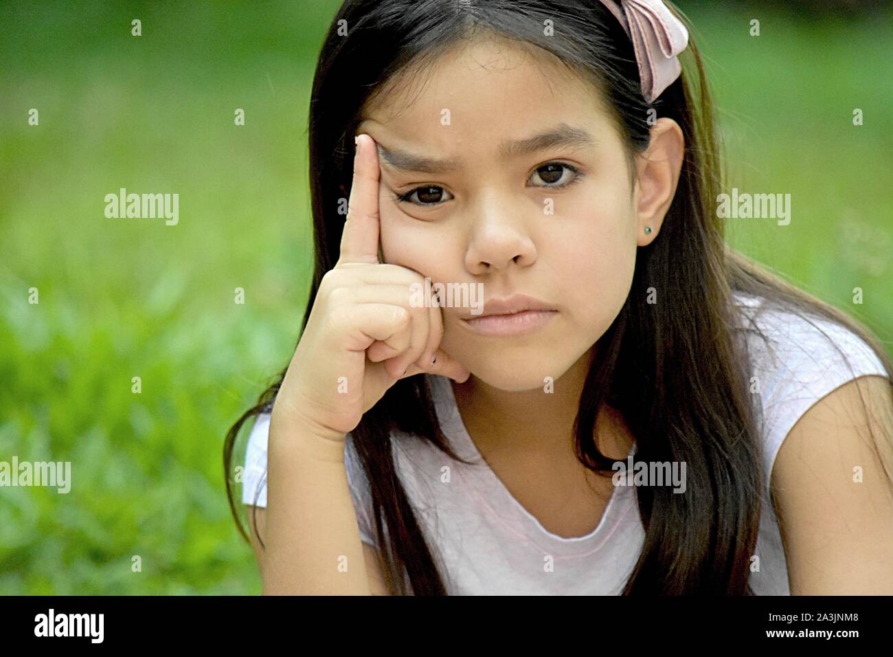 A Filipina Girl Deciding Stock Photo