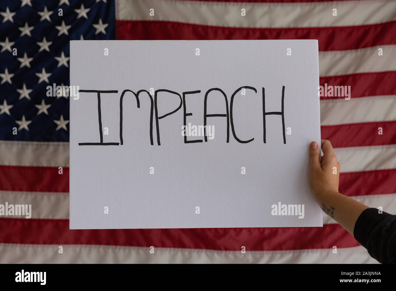 Female protester holding sign hi-res stock photography and images - Alamy