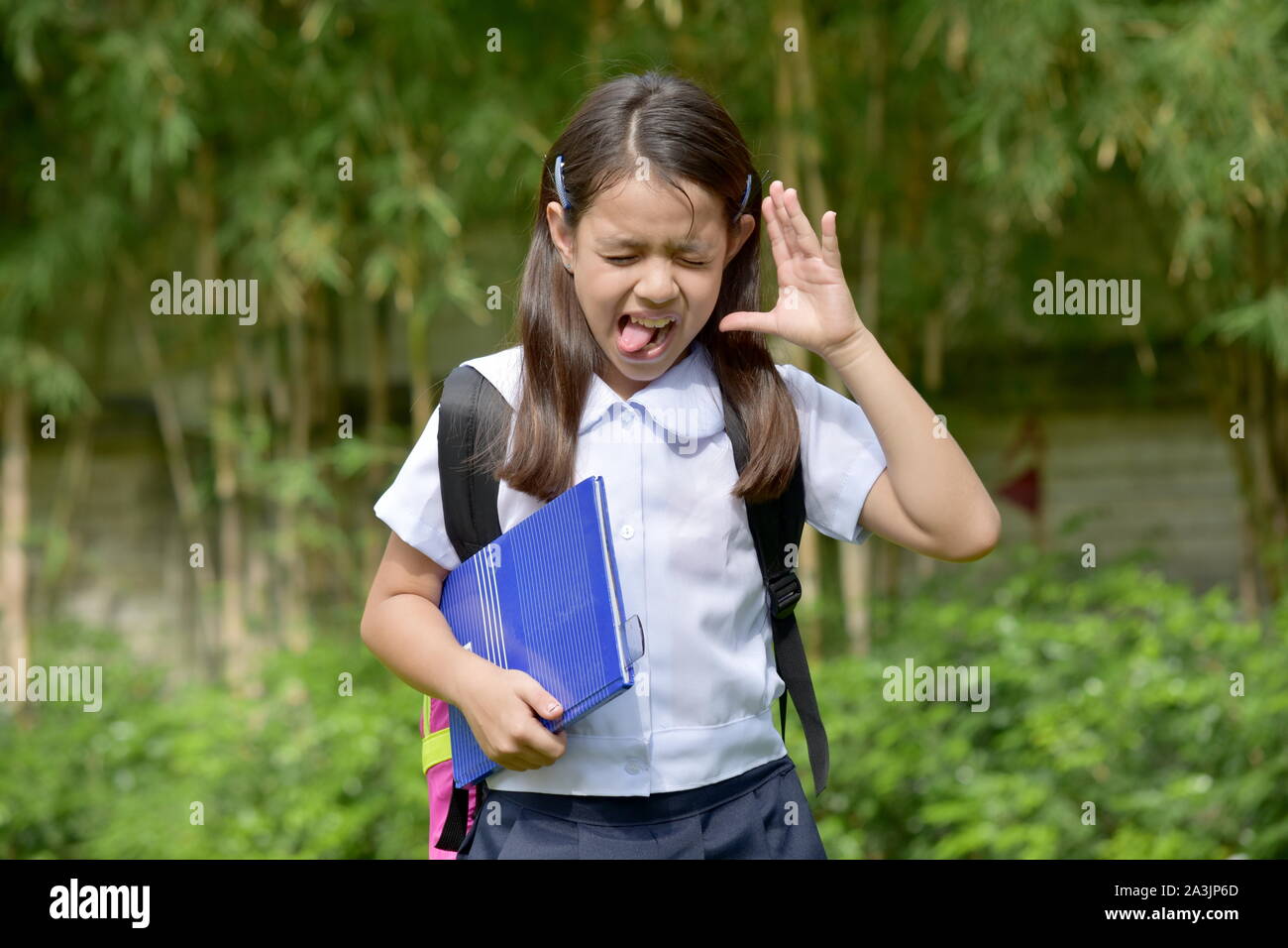 An Insane School Girl Wearing School Uniform Stock Photo - Alamy