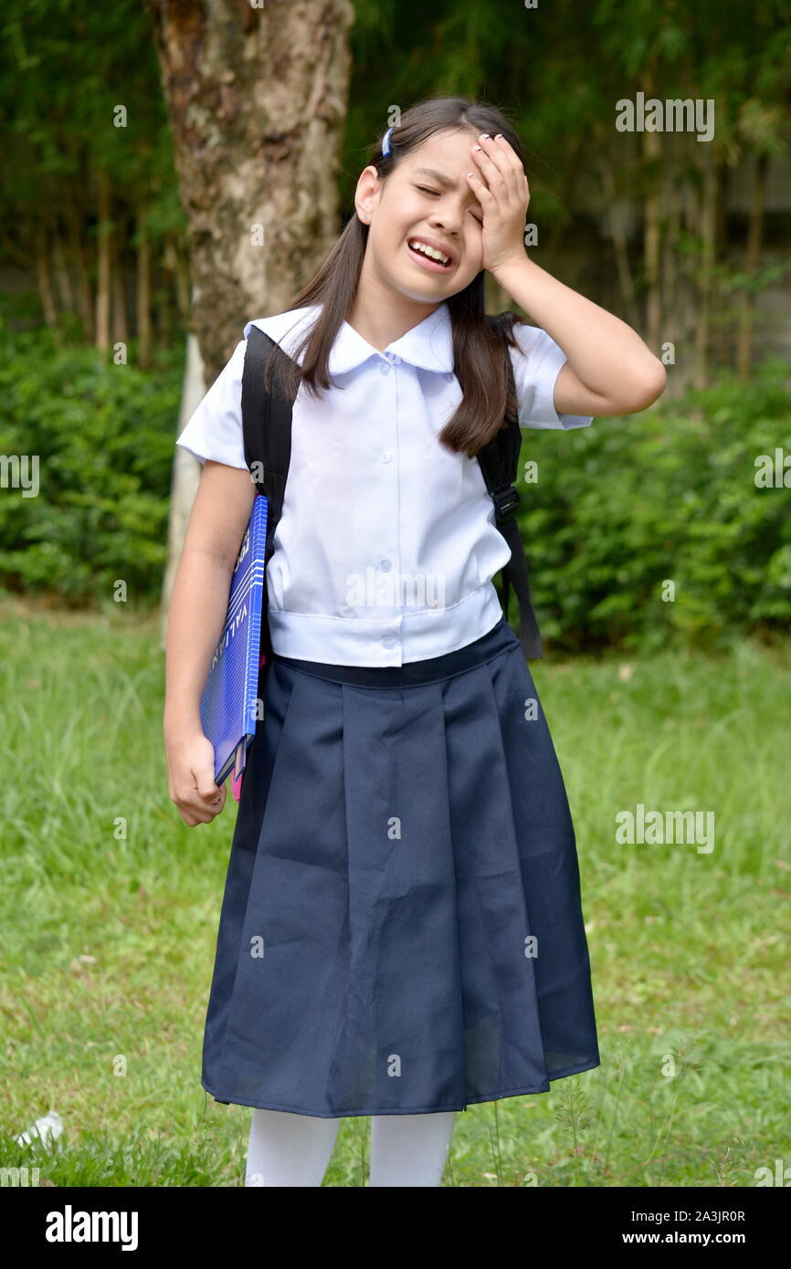Worried girl uniform hi-res stock photography and images - Alamy