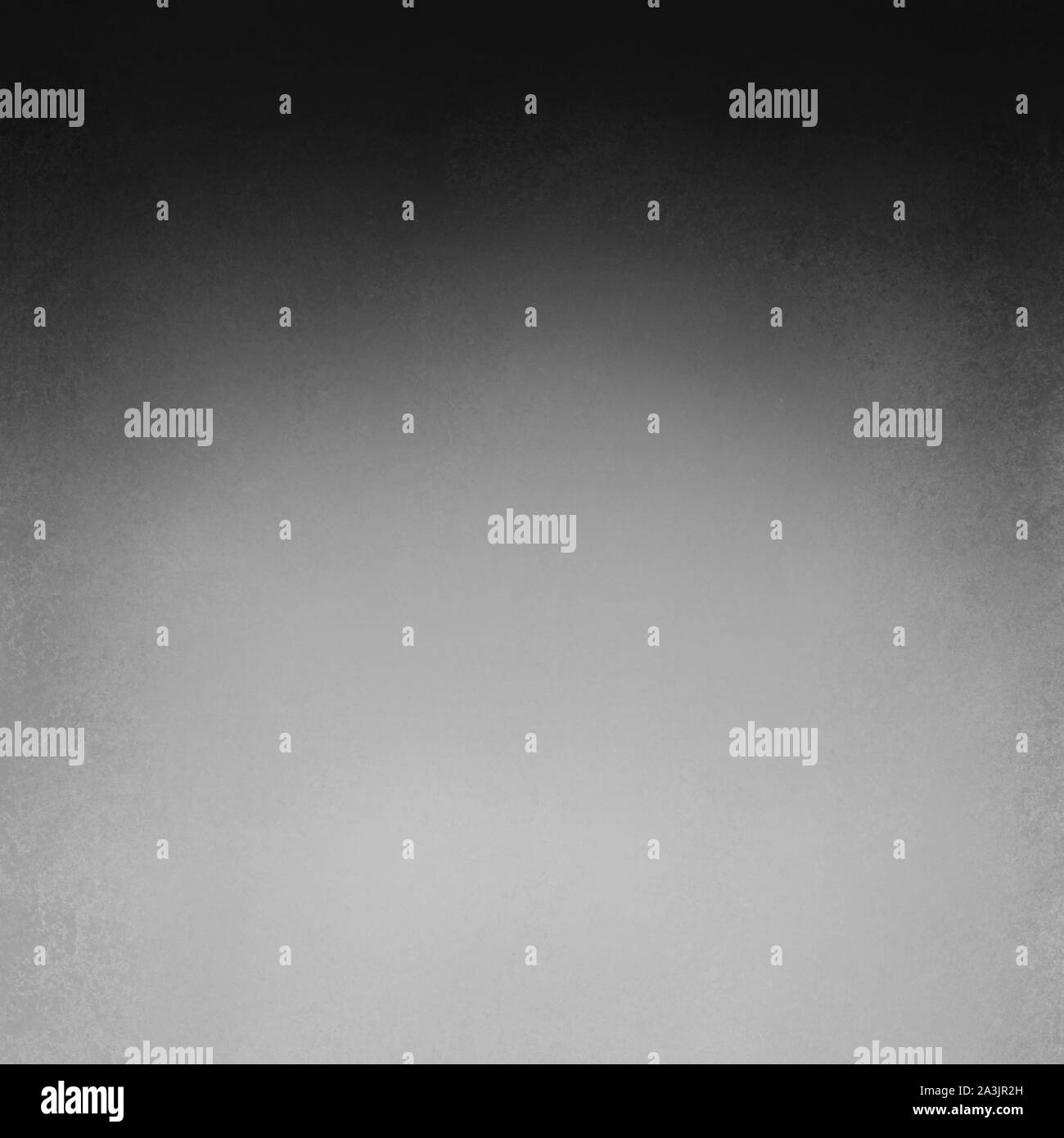 black and white background with soft foggy and shiny center and dark black top border shadow with faint distressed texture in elegant design Stock Photo