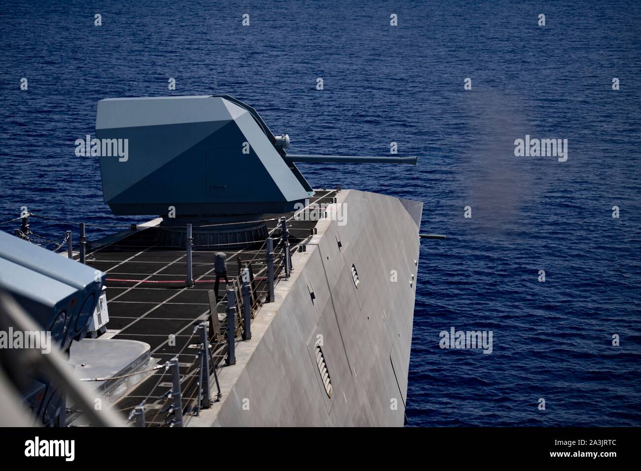 191006-N-YI115-1186 PHILIPPINE SEA (Oct. 6, 2019) Independence-variant littoral combat ship USS Gabrielle Giffords (LCS 10) engages a high-speed maneuvering surface target  with a MK 110 57mm gun during a live-fire exercise as part of Exercise Pacific Griffin 2019. Pacific Griffin is a biennial exercise conducted in the waters near Guam aimed at enhancing combined proficiency at sea while strengthening relationships between the U.S. and Republic of Singapore navies. (U.S. Navy photo by Mass Communication Specialist 3rd Class Josiah J. Kunkle/Released) Stock Photo