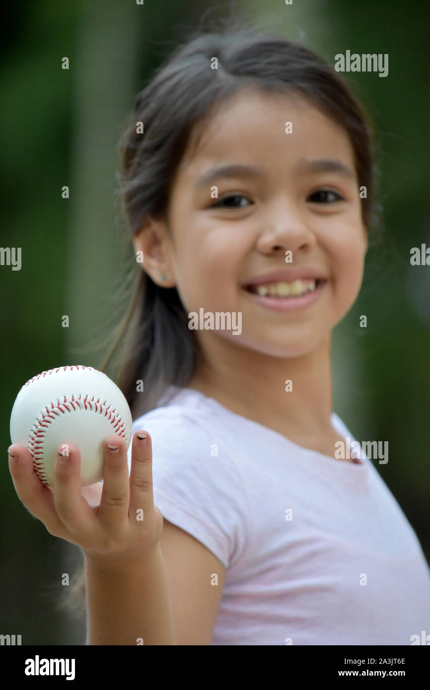 A Child Baseball Player And Happiness Stock Photo