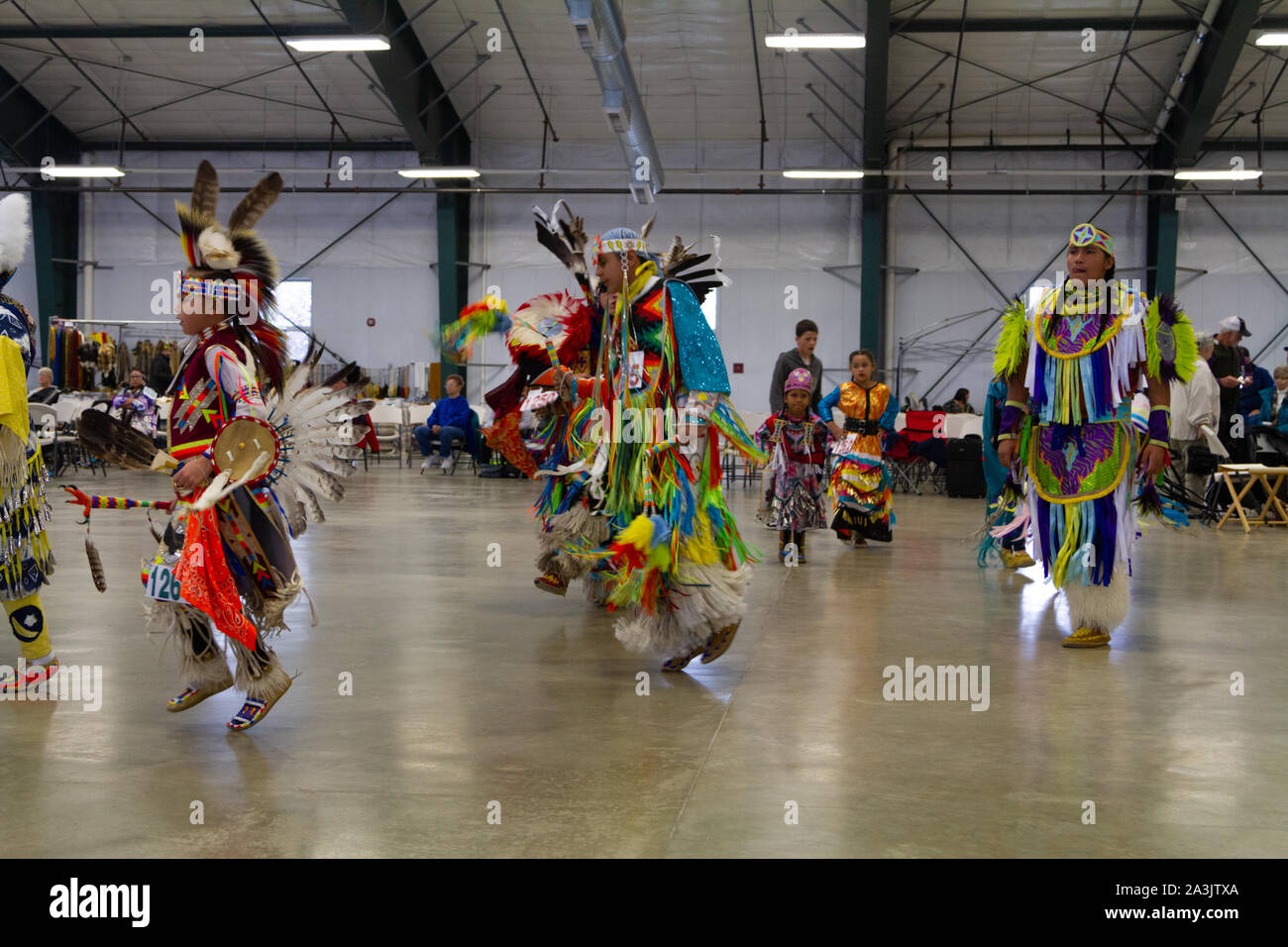 Native American Dancers Dressed In Full Regalia At A Pow Wow Where Native American Dancers Dressed In Full Regalia At A Pow Wow Where