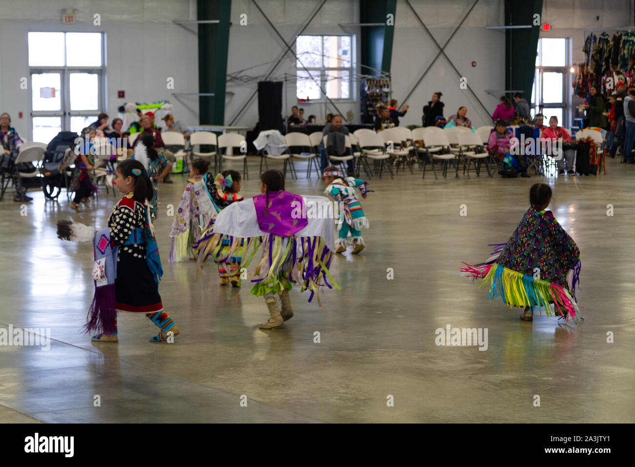 Young Native American Dancers In Full Regalia At A Pow Wow Where Young Native American Dancers In Full Regalia At A Pow Wow Where