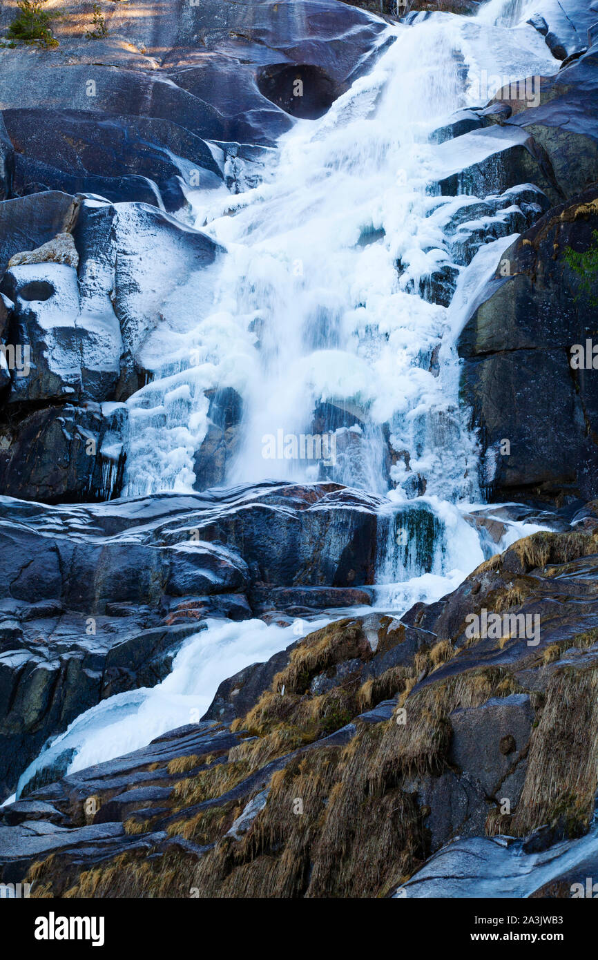Partially frozen Shannon Falls in winter, Squamish, BC Stock Photo