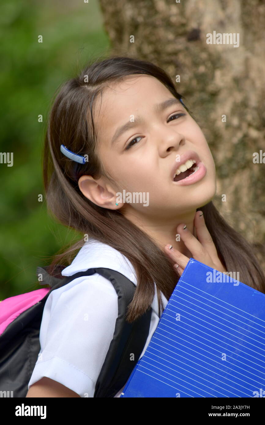 An Unhappy Prep School Girl Stock Photo
