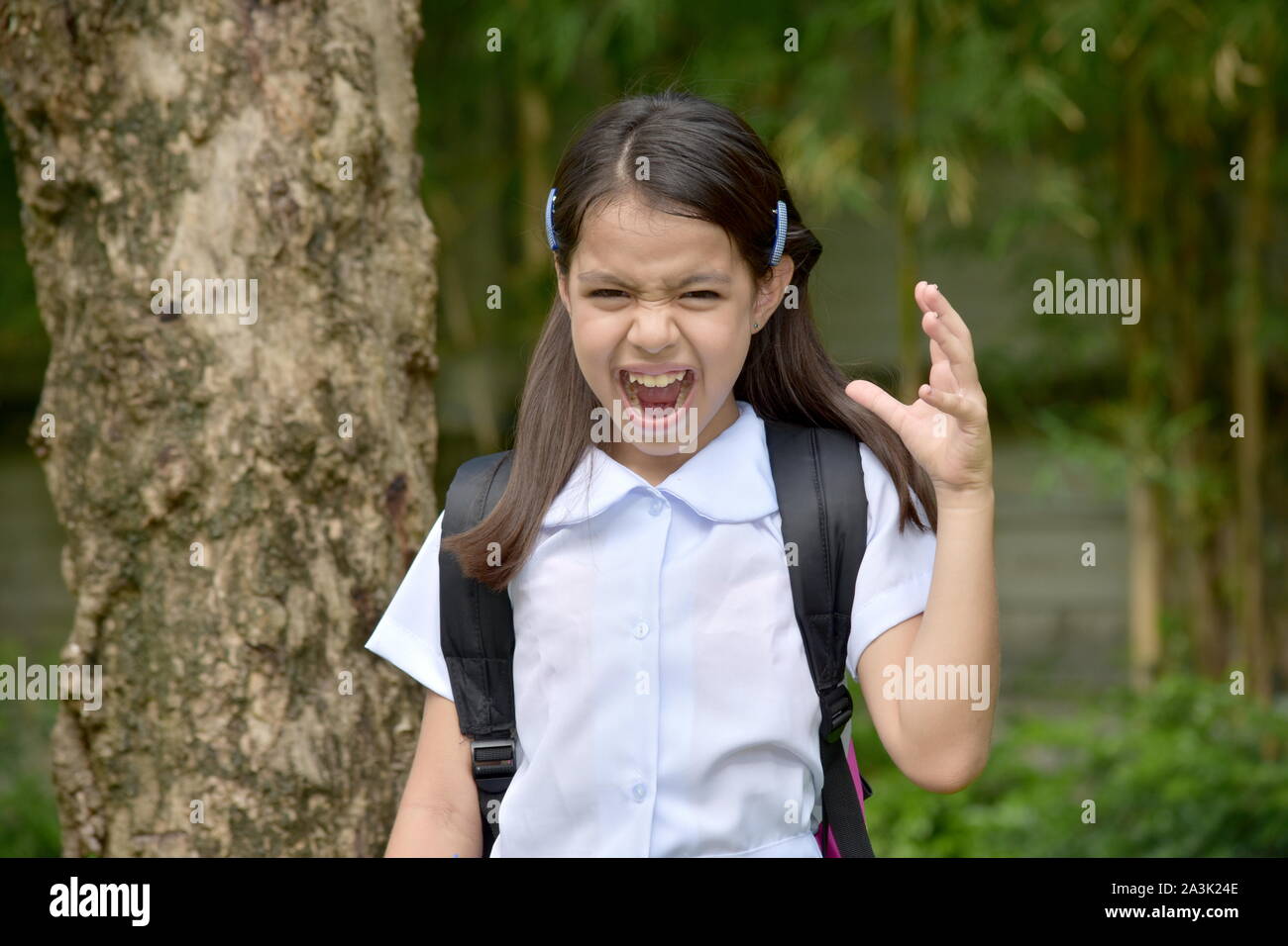 School Girl Under Stress Wearing School Uniform Stock Photo Alamy