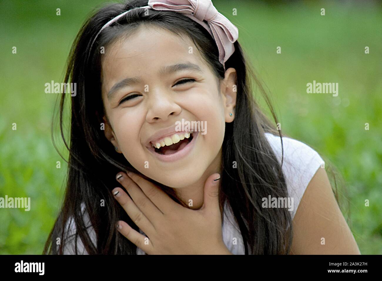 A Young Filipina Female And Laughter Stock Photo